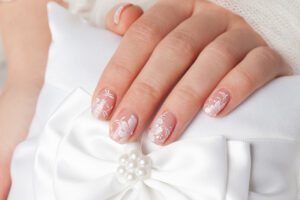 Read more about the article Classic Manicure: Includes nail shaping, cuticle care, a relaxing hand massage, and your choice of polish.